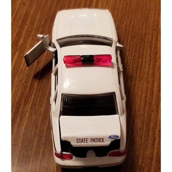 North Dakota State Patrol Road Champs die cast police car 1:43 scale - Picture 4 of 10